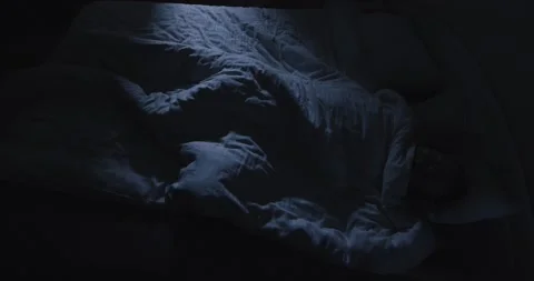 Man suffers from insomnia and cannot sleep Stock Footage 166745961