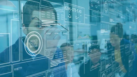 Man in suit adjusting glasses and activating tech panels scanning eye movements Stock Footage 309687126