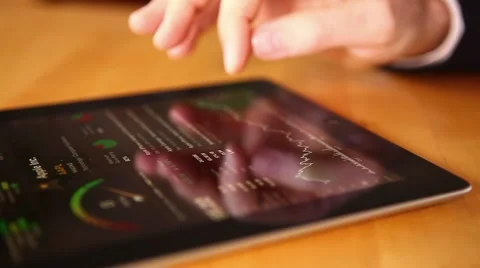 Man in suit Checking Finances on Ipad - Tablet PC Stock Footage 40261808