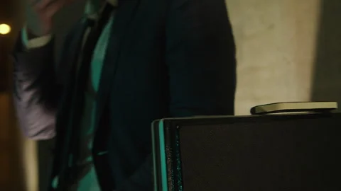 A man in a suit having a smoke Vídeo Stock 259647553