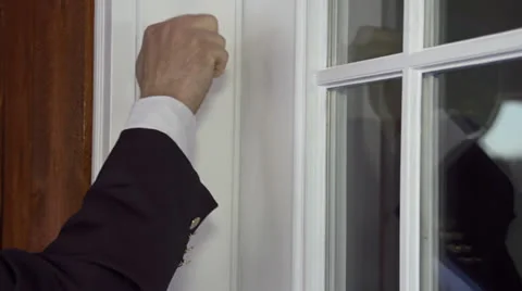 Man in Suit Knocks on Door Slow Motion Close Stock Footage 22667488