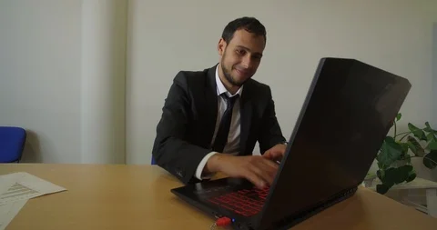 A man In a Suit Lets His Joy Explode Stock Footage 123512858