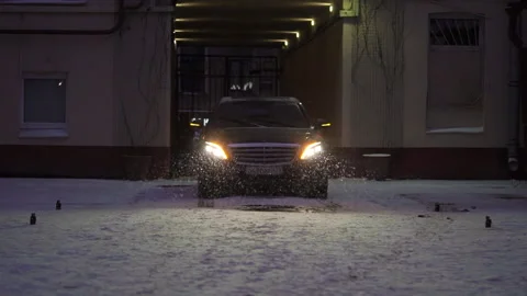 A man in a suit opens the back door of a premium car. Luxurious black vehicle. Stock-Footage 238623963