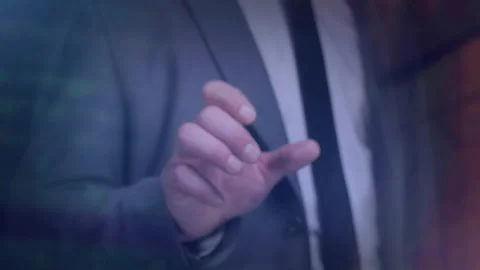 A man in a suit presses the screen in close-up. Video stock 164307185