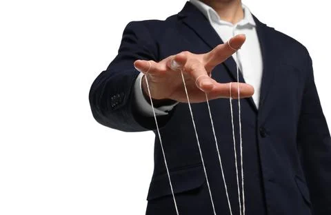 Man in suit pulling strings of puppet on white background, closeup 스톡 사진