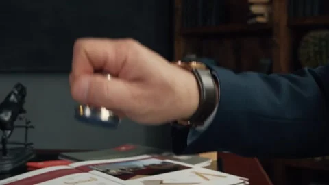 Man in suit putting stamp on documents Stock Footage 266248872