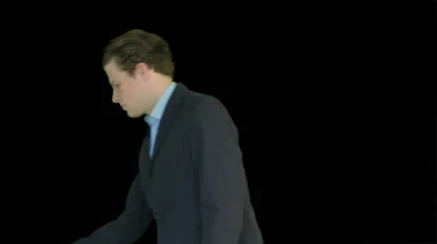 Man in suit showing object Stock Footage 40926980