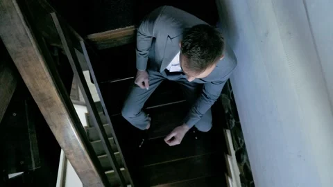 Man in a suit on the stairs Stock Footage 149117762
