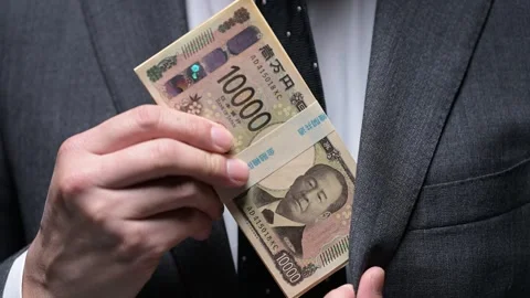 Man in a suit taking a bundle of new banknotes from his pocket Stock Footage 336765866