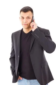 Man in a suit talking over mobile Stock Photos
