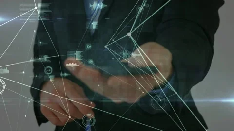 Man in suit tapping phone and causing HUD nodes to build, visualizing business Video stock 332505151