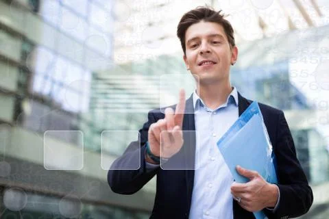 Man in suit touching screen Foto stock