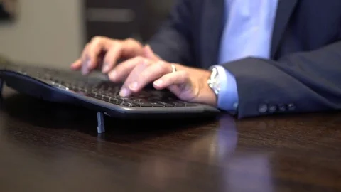 Man In Suit Typing On Keyboard 스톡 동영상 78207997