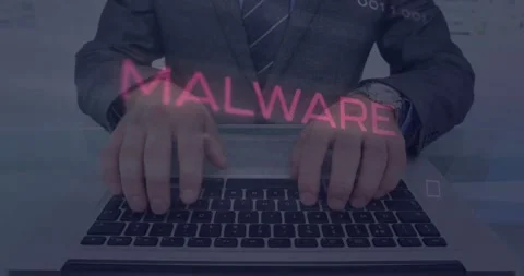 Man in suit typing on keyboard, starting security HUD spelling MALWARE, neon Stock Footage 329946733