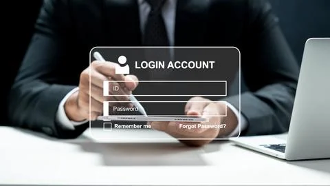 A man in a suit uses a tablet with a virtual login interface overlay. Conce.. 写真素材
