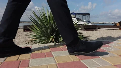 A man in a suit is walking Stock Footage 143250494