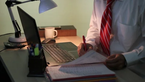 Man in suit works with laptop computer in office. Business man working Stock-Footage 119113532