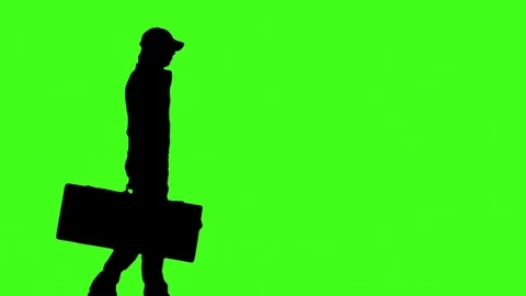 Man with suitcase goes up and down and waits for something Stock Footage 72110291