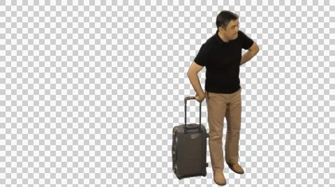 Man with a suitcase waiting for something, Full HD footage with alpha channel. Video stock 50977825