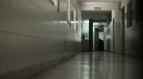 Man with suitcase walking along the corridor 03 Stock Footage 54781933