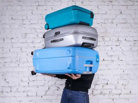 The man with the suitcases Stock Photos