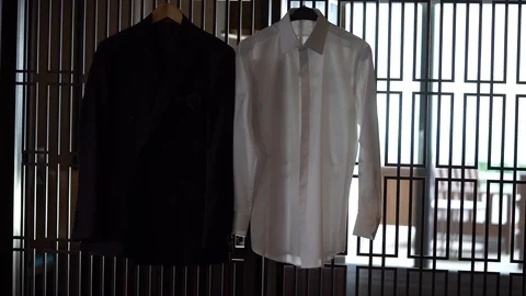Man suite black jacket and white shirt close up shooting Video stock 128948009