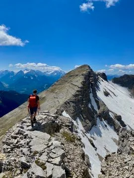 Man on summit in alps, mountain view, blue sky, Soiernspitz, Bavaria, Germany Stock Photos