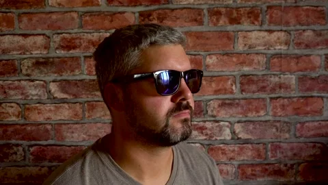 Man with sunglasses 4K Stock Footage 160119010