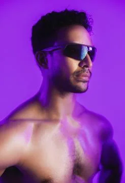 Man, sunglasses and topless in studio with bodybuilding, muscle or aestheti.. Stock Photos