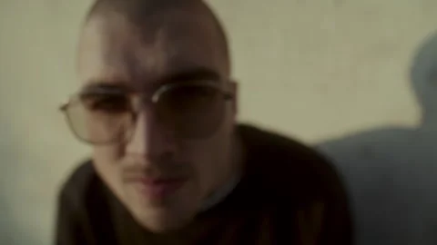 Man with Sunglasses Looking At Camera 스톡 동영상 258276819