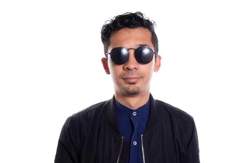 Man with sunglasses looking at the camera. Isolated on white background. Is Fotos de archivo