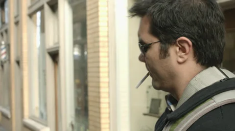 Man in Sunglasses Winks to Camera CU Stock Footage 36976489