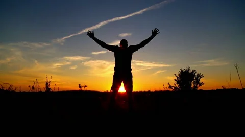 Man at sunset in the field (running, jumping) Stock Footage 40382659