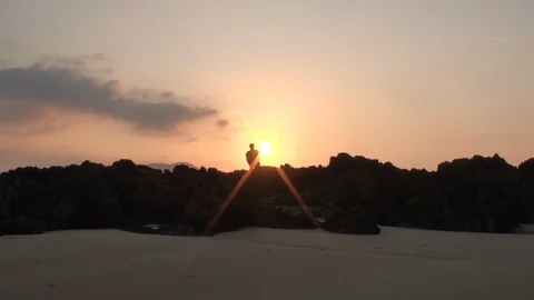 Man at sunset Stock Footage 99399805
