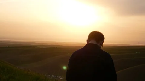 Man in the sunset Stock Footage 239354673