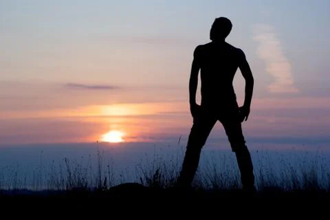 Man at the sunset Stock Photos