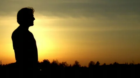 Man at sunset saluting with sword Video stock 496489