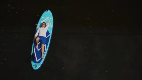 Man on sup board Stock Footage 247064310