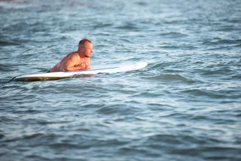 A man with SUP at sea Stock Photos