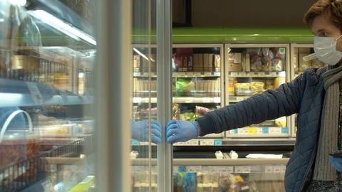 A man in the supermarket Stock Footage 128471966