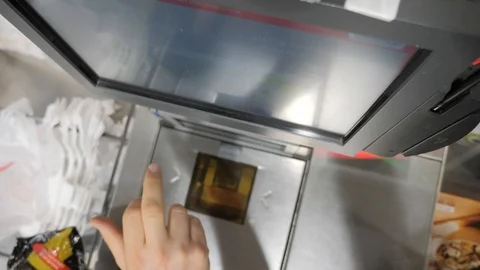 Man at supermarket use touch screen of self checkout Stock Footage 86193384