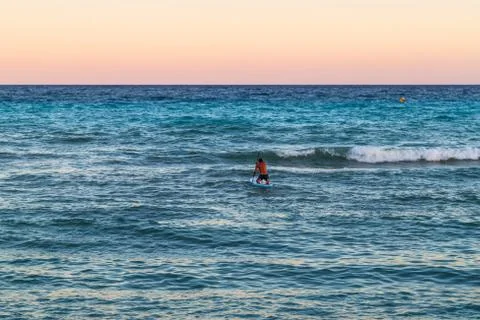 Man on a surfboard Stock Photos
