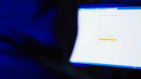 Man Surfing Internet At Night Stock Footage 34855133