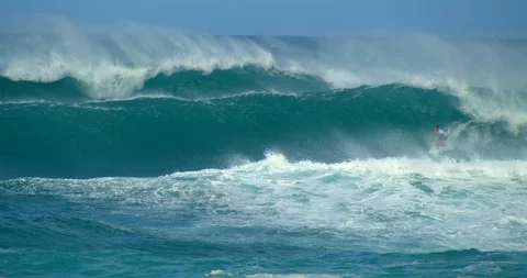 Man Surfing Large Wave in Crystal Blue Ocean, Slow Motion Stock Footage 127517963