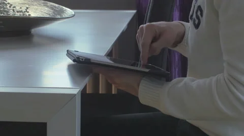 Man surfing on a tablet Stock Footage 61274028