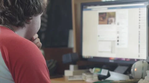 Man Surfs Facebook Stock Footage 41554344