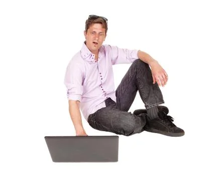 Man surprised on the computer screen. Stock Photos