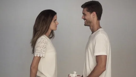 Man surprising girlfriend with gift Stock Footage 75191829