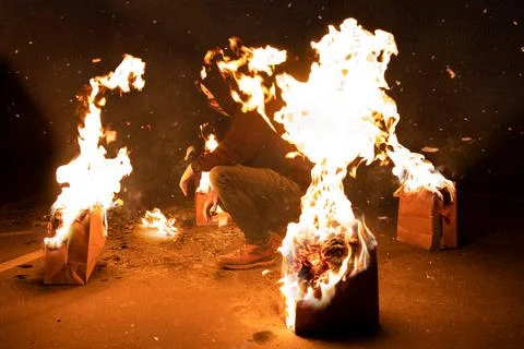 Man surrounded by fire Stock Photos