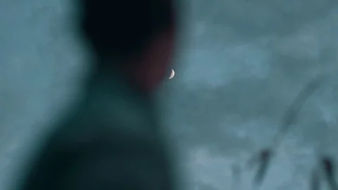Man Surveys Moon Stock Footage 81563612
